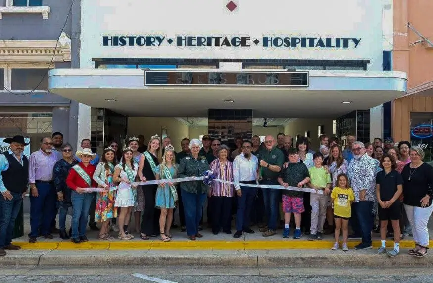 Group of people at a ribbon-cutting ceremony